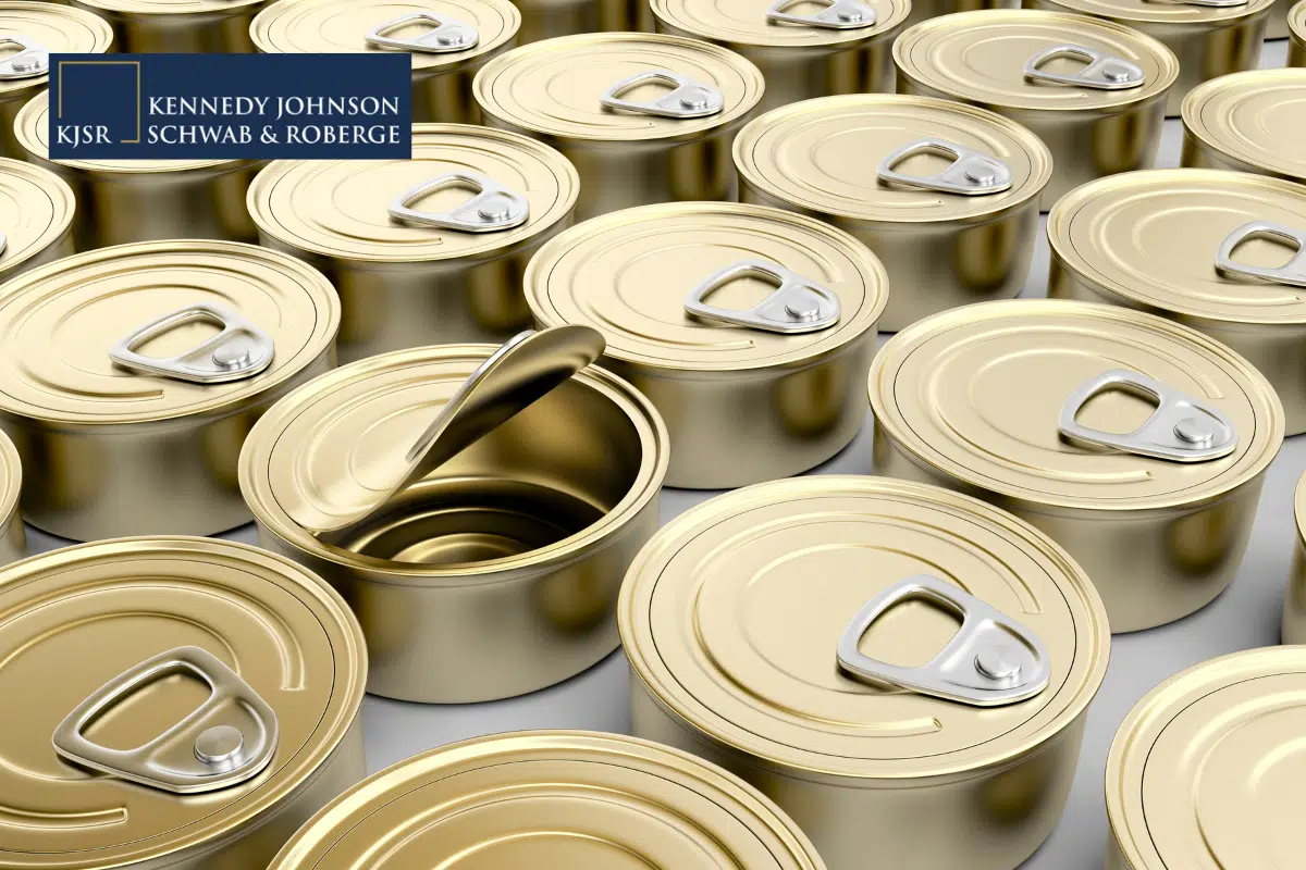 a row of cans in a factory