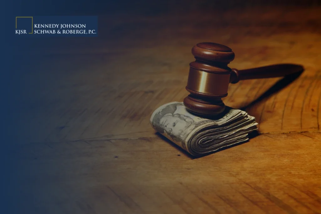 A pile of money under a gavel